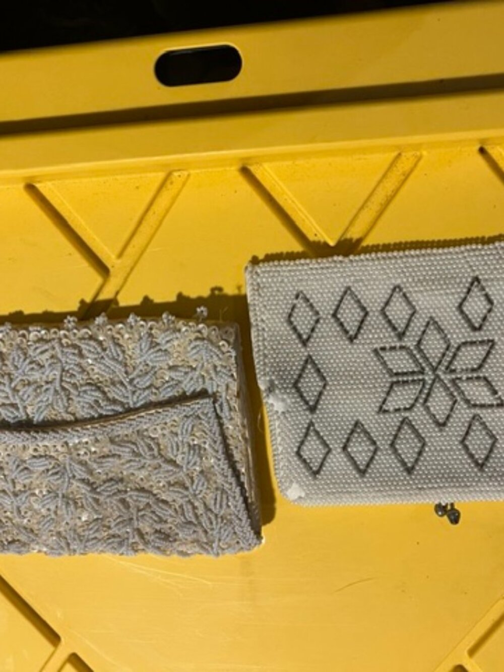 Vintage purses with beading. One yellow one cream colored